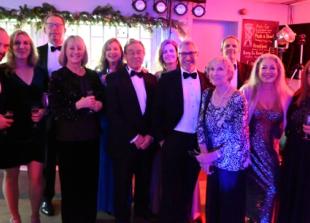 Rugby dinner with singer raises £5,000 for club