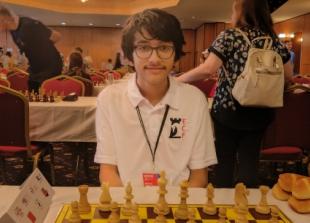 Chess boy climbs world ranking at youth contest