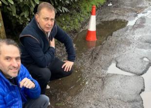 Road riddled with potholes to be fixed after criticism