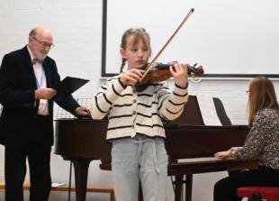 Children show confidence in playing for each other