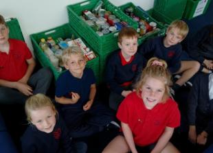 Children from Heights Primary School deliver supplies to foodbanks