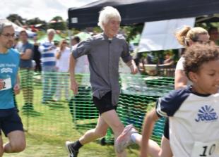 Running reverend challenges villagers