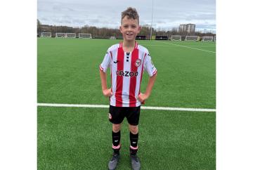 Cox Green footballer turns setback into business start-up with new shin pads