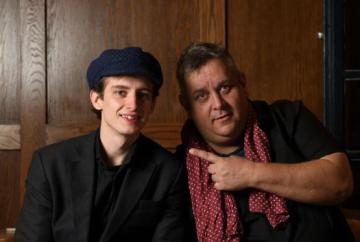 Musical fusion with dad on piano and son on sax