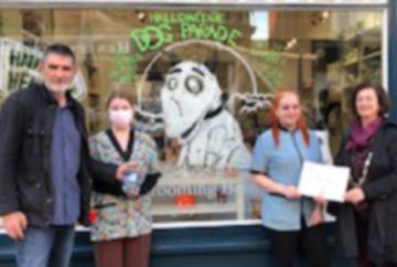 Pet groomer wins Halloween shop window display contest with ‘ghost dog’