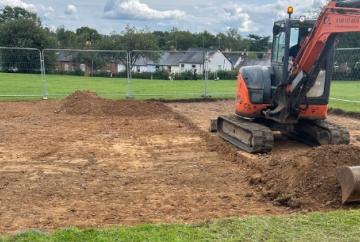 By George! Work begins on new basketball half-court