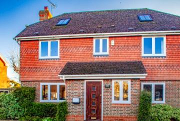 Champion of poor gives his name to village home Champion of poor gives his name to village home