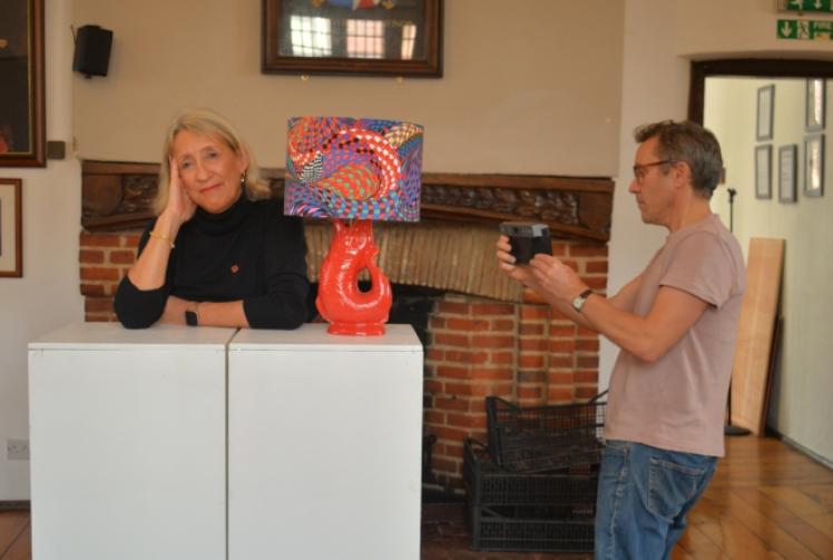 Artist puts heads together as ‘spine’ project takes shape