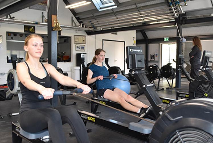 Girls row through night to fund camp