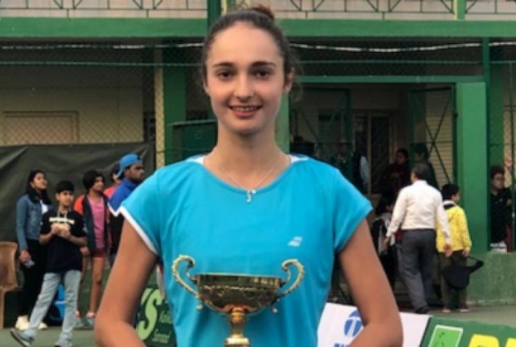 Teenager overcomes injury to lift title