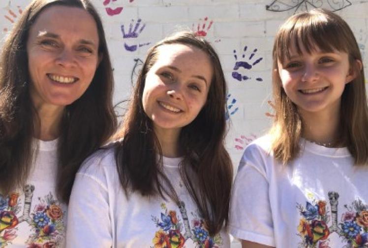 Girl sells virus design T-shirts