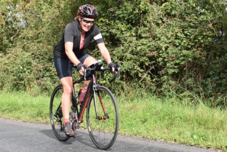 Woman cycles equivalent height of Everest for charity