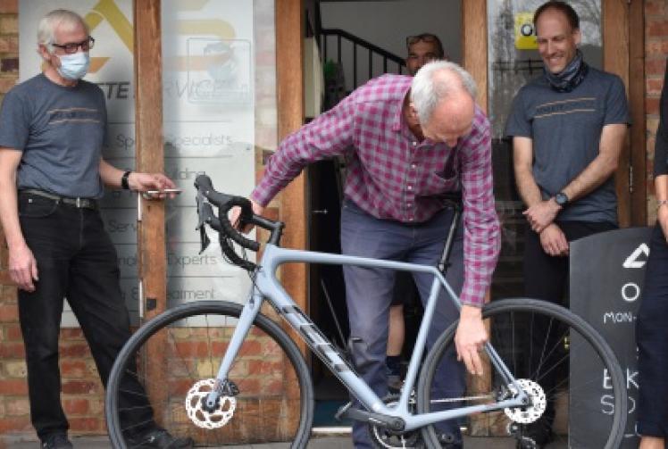 Cycling former pastor presented with new road bike