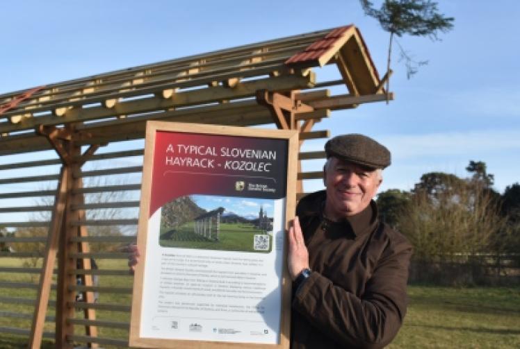 Slovenians erect traditional hayrack to celebrate twinning link