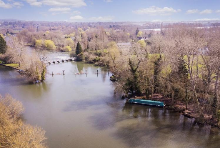 Riverside garden with mooring
