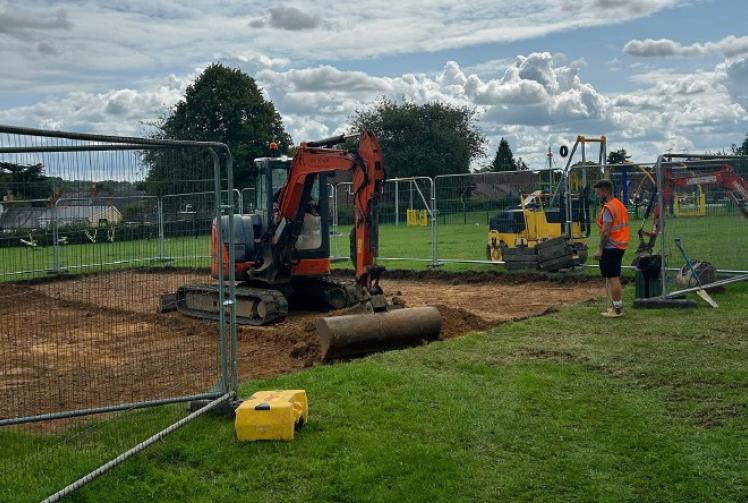 By George! Work begins on new basketball half-court