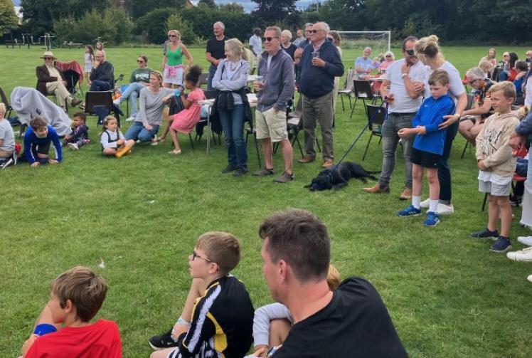 Village barbecue raises £1,000 on return