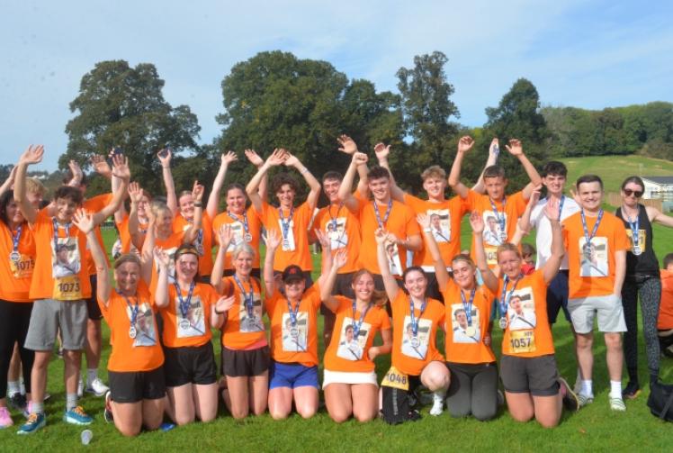 Late entrant wins half marathon as his dad finishes 40th and last one