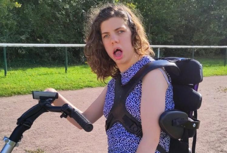 Disabled woman raises £3,000 for charity with triathlon