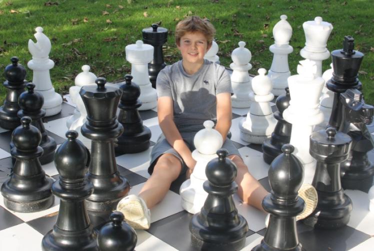 Children’s chess teacher, aged 12