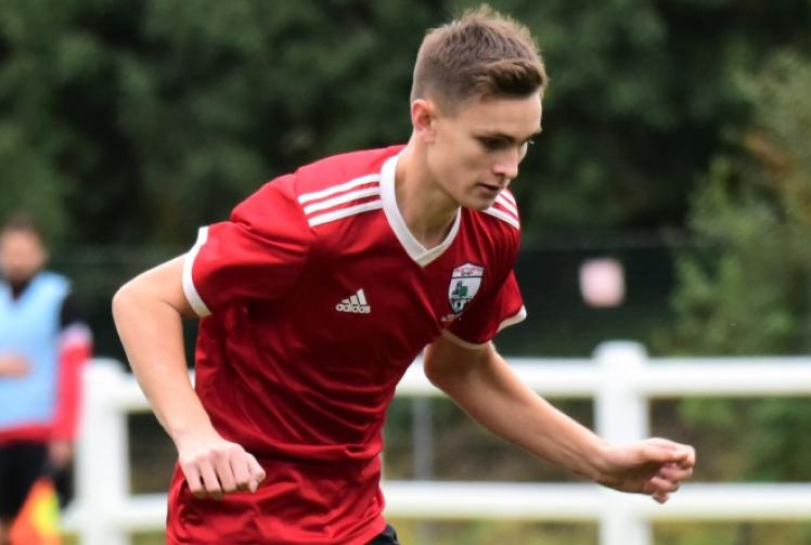 Aitchison’s fingertip save ensures share of spoils