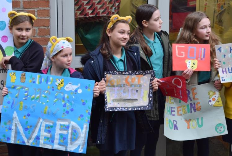 Pudsey dances and hugs children during school visit