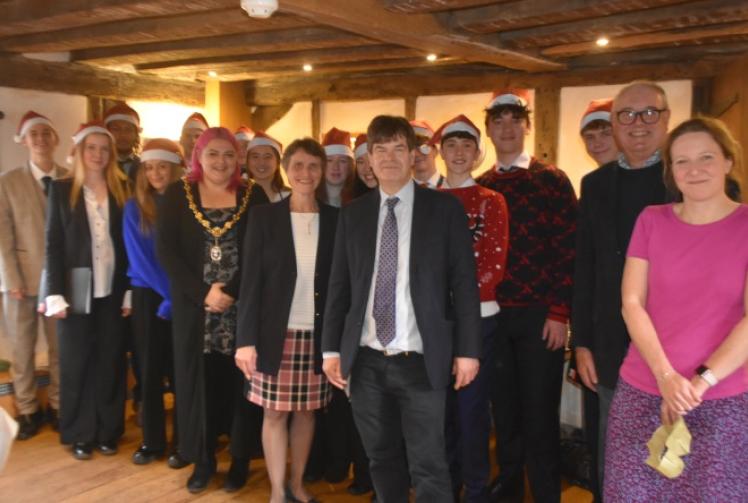 Almshouses residents on a high with Christmas lunch and singing by students