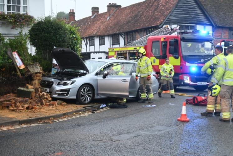 Driver rushed to hospital after car ploughs into wall