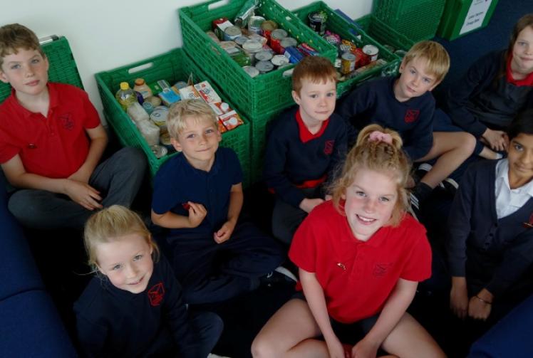 Children from Heights Primary School deliver supplies to foodbanks