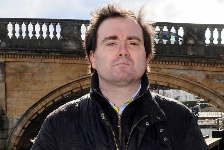 Shop worker axed for online posts