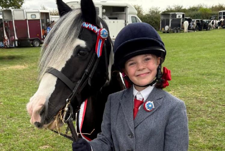 Birthday to remember for girl, nine, crowned show champion