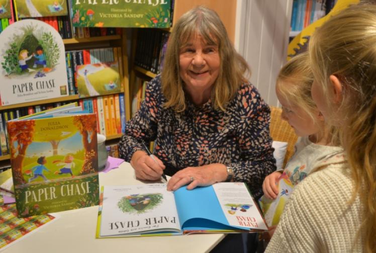 Children’s author drops in to shop to sign copies of latest book