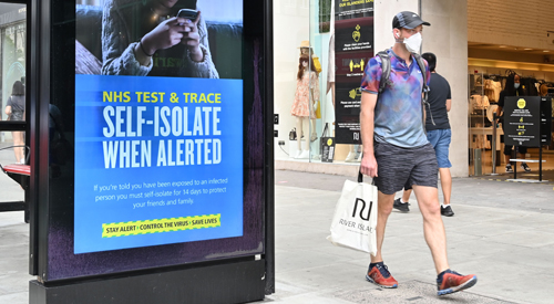 IMPORTANT MESSAGE: The NHS Test and Trace messaging on a high street billboard.